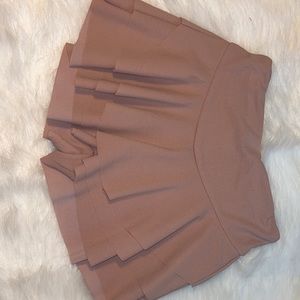 pinkish/brown skirt with a built in pair of shorts.